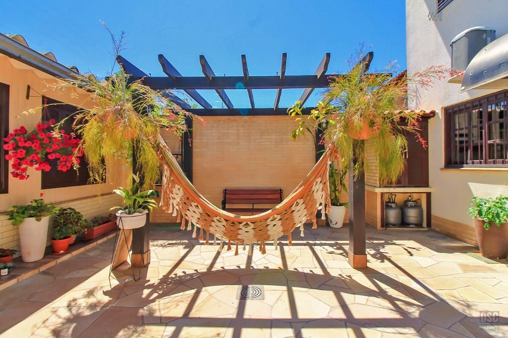 Casa à venda em Porto Alegre, Cavalhada, com 3 quartos, 198m² - Geniale Imóveis